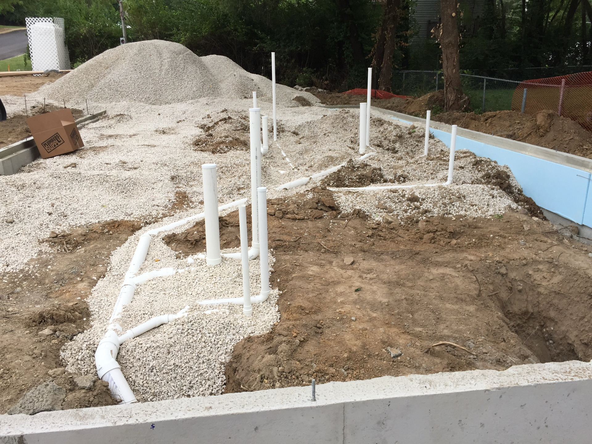 Under-slab plumbing rough-in for new residential construction in the St. Louis metro