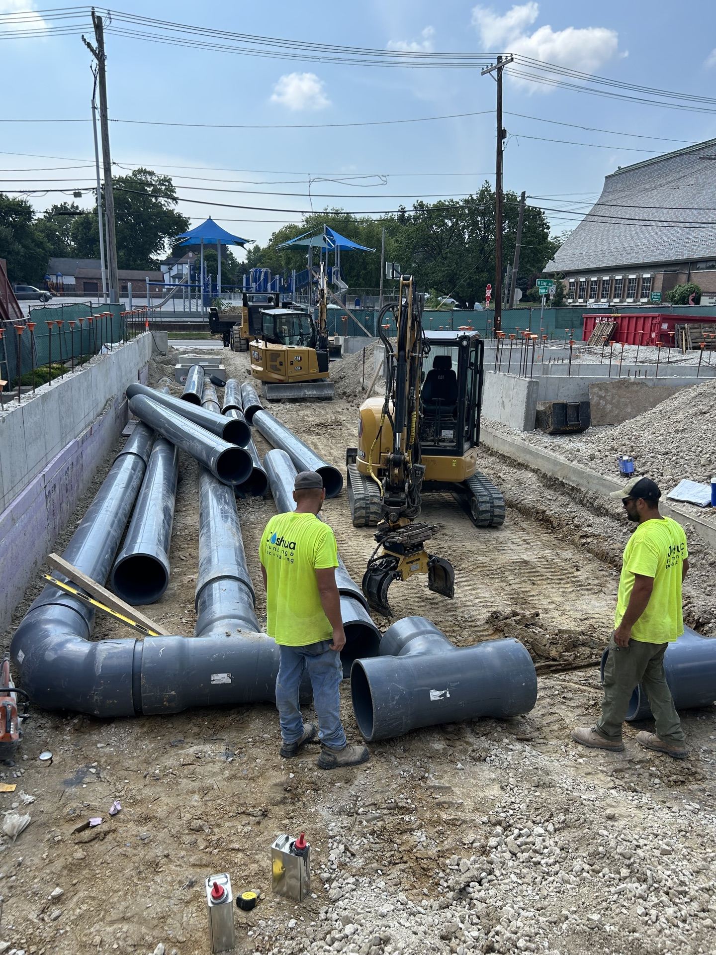 Joshua Plumbing crew installing large-diameter sewer main in St. Louis
